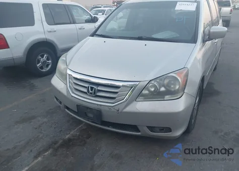 2008 Honda Odyssey Touring z USA, uszkodzony, nr VIN 5FNRL38948B114891